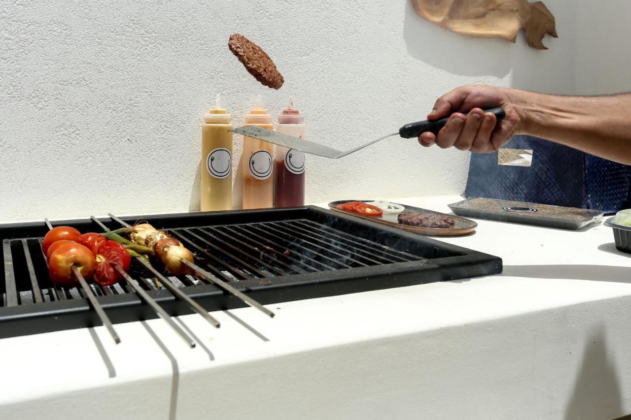Cloud 7 Residences Ayla 亚喀巴 外观 照片 A spatula in use